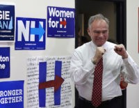Democratic vice presidential candidate, Sen. Tim Kaine, D-Va. pumps his fists after being introduced during a campaign stop, Thursday, Sept. 1, 2016, in Dover, N.H. (AP Photo/Charles Krupa)
