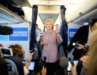 Democratic presidential candidate Hillary Clinton speaks to members of the media on her campaign plane, in White Plains, Thursday, Sept. 15, 2016, while traveling to Greensboro, N.C. for a rally. Clinton returned to the campaign trail after a bout of pneumonia that sidelined her for three days and revived questions about both Donal Trump's and her openness regarding their health. (AP Photo/Andrew Harnik)