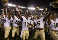PHILADELPHIA, PA - SEPTEMBER 02: Quinten Parker #85, Richard Hanson #26, Ahmad Bradshaw #17, Joe Walker #5, and Gervon Simon #10of the Army Black Knights celebrate after the game against the Temple Owls at Lincoln Financial Field on September 2, 2016 in Philadelphia, Pennsylvania. The Black Knights defeated the Owls 28-13. (Photo by Mitchell Leff/Getty Images)