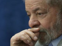 Brazil's former President Luiz Inacio Lula da Silva attends the impeachment trial of Brazil’s suspended President Dilma Rousseff, in Brasilia, Brazil, Monday, Aug. 29, 2016. Fighting to save her job, Rousseff told senators on Monday that the allegations against her have no merit. Rousseff's address comes on the fourth day of the trial. (AP Photo/Eraldo Peres)