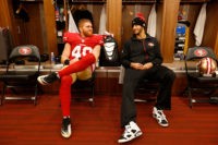 SANTA CLARA, CA - JANUARY 3: Bruce Miller #49 and Colin Kaepernick #7 of the San Francisco 49ers relax in the locker room prior to the game against the St. Louis Rams at Levi Stadium on January 3, 2016 in Santa Clara, California. The 49ers defeated the Rams 19-16. (Photo by Michael Zagaris/San Francisco 49ers/Getty Images)