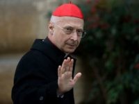 Italian cardinal Angelo Bagnasco arrives for a meeting on the eve of the start of a conclave on March 11, 2013 at the Vatican. Cardinals will hold a final set of meetings on Monday before they are locked away to choose a new pope to lead the Roman Catholic Church through troubled times.  AFP PHOTO / JOHANNES EISELE        (Photo credit should read JOHANNES EISELE/AFP/Getty Images)