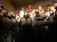 Fighters from the former Al-Nusra Front -- renamed Fateh al-Sham Front after breaking from Al-Qaeda -- listen to a speech at an armament school after they recaptured two military academies and a third military position south of Aleppo on August 6, 2016, the Syrian Observatory for Human Rights said. A Syrian coalition of jihadists and Islamist seized key positions south of Aleppo as they press a major offensive to break the government siege of the city, the monitor said. / AFP / Omar haj kadour (Photo credit should read OMAR HAJ KADOUR/AFP/Getty Images)