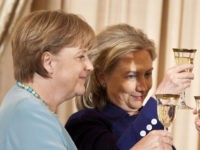 WASHINGTON - JUNE 7: (L-R) German Chancellor Angela Merkel, Secretary of State Hillary Rodham Clinton and Vice President Joseph R. Biden toast each other during a luncheon at the US State Department June 7, 2011 in Washington, DC. Secretary of State Hillary Rodham Clinton and Vice President Joseph R. Biden hosted German Chancellor Angela Merkel for a luncheon during her visit to Washington before tonight's State Dinner. (Photo by Brendan Smialowski/Getty Images)