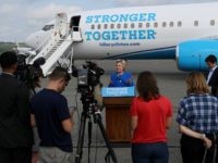 Democratic presidential nominee former Secretary of State Hillary Clinton speaks to reporters on the tarmac at Westchester County Airport on September 8, 2016 in White Plains, New York.
