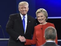 Democratic nominee Hillary Clinton (R) shakes hands with Republican nominee Donald Trump during the first presidential debate at Hofstra University in Hempstead, New York on September 26, 2016. / AFP / Paul J. Richards        (Photo credit should read PAUL J. RICHARDS/AFP/Getty Images)