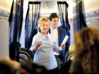 Hillary on her plane, gaggle Andrew HarnickAP