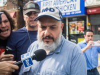 Mohammad Rahami, Explosion in New York, USA - 20 Sep 2016 Father of Ahmad Khan Raham is escorted to his car by an FBI agent outside his business First American Fried Chicken in Elizabeth, New Jersey (Rex Features via AP Images)