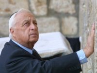 Israeli Prime Minister-elect Ariel Sharon places his hand on the Western Wall, Judaism's holiest site, in the Old City of Jerusalem 07 February 2001. Prime Minister Ariel Sharon was fighting for life 05 January 2006, after suffering a massive brain haemorrhage, throwing Israel into turmoil barely three months before a general election likely to determine the future of Middle East peacemaking. AFP PHOTO/THOMAS COEX (Photo credit should read THOMAS COEX/AFP/Getty Images)