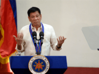 Philippine President Rodrigo Duterte gestures as he talks during the Assumption of Command Ceremony of Philippine National Police (PNP) chief Ronald Bato Dela Rosa at the Camp Crame in Manila on July 1, 2016. Authoritarian firebrand Rodrigo Duterte was sworn in as the Philippines' president on June 30, after promising a ruthless and deeply controversial war on crime would be the main focus of his six-year term. / AFP / NOEL CELIS (Photo credit should read NOEL CELIS/AFP/Getty Images)