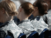 oldiers, officers and civilian employees attend the commencement ceremony for the U.S. Army's annual observance of Sexual Assault Awareness and Prevention Month in the Pentagon Center Courtyard March 31, 2015 in Arlington, Virginia. In conjunction with the national campaign against sexual assault, The Army announced this year's theme, 'Not in My Squad. Not in Our Army. We are Trusted Professionals,' during the ceremony.Ê According to the Pentagon, the initative 'is a grassroots approach meant to reinforce a climate of dignity and respect founded on good order and discipline.' (Photo by Chip Somodevilla/Getty Images)