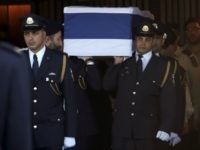 Members of the Israeli Knesset guard carry the coffin of former Israeli president Shimon Peres at the Knesset, Israel's Parliament, in Jerusalem on September 29, 2016. The body of Shimon Peres was lying in state outside Israel's parliament as the world pays tribute to a statesman whose funeral is expected to draw leaders from around the globe. The ex-president died on September 28, 2016 at the age of 93 after suffering a stroke. / AFP / GALI TIBBON (Photo credit should read GALI TIBBON/AFP/Getty Images)