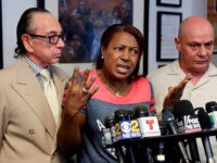 Maribel Martinez, accompanied by her attorney Sanford Rubenstein, left, and a translator, speaks at a news conference at her attorney's office, in the Brooklyn borough of New York, Thursday, Sept. 1, 2016. Martinez says she hasn't stopped crying since JetBlue airlines mistook her son for another child and flew him to the wrong city. (AP Photo/Richard Drew)