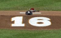 Flowers, a hat and the number of Miami Marlins pitcher Jose Fernandez is shown on the pitching mound at Marlins Park on September 25, 2016 in Miami, Florida