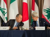 Russian Foreign Minister Sergei Lavrov and United States Secretary of State John Kerry speak during the International Syria Support Group meeting, September 22, 2016 in New York
