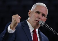 Republican Vice Presidential candidate, Indiana Gov. Mike Pence, gestures as he speaks at Liberty University in Lynchburg, Va., Wednesday, Oct. 12, 2016. (AP Photo/Steve Helber)