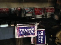 Melted campaign signs are seen at the Orange County Republican Headquarters in Hillsborough, NC on Sunday, Oct. 16, 2016.  Someone threw flammable liquid inside a bottle through a window overnight and someone spray-painted an anti-GOP slogan referring to "Nazi Republicans" on a nearby wall, authorities said Sunday. State GOP director Dallas Woodhouse said no one was injured. (AP Photo/Jonathan Drew)