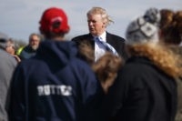 Republican presidential candidate Donald Trump talks with visitors as he tours Gettysburg National Military Park, Saturday, Oct. 22, 2016, in Gettysburg, Pa. (AP Photo/ Evan Vucci)
