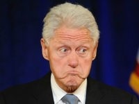 Bill-Clinton-frown-1-AP