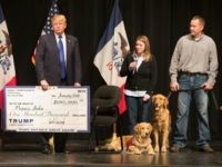 Republican presidential candidate Donald Trump presented a check to the Puppy Jake on January 30, 2016 in Davenport, Iowa.