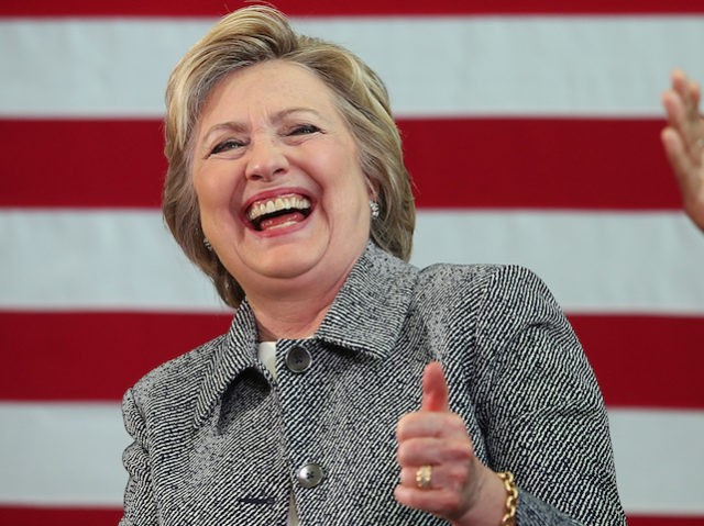 HARTFORD, CT - APRIL 21:  Democratic presidential candidate former Secretary of State Hillary Clinton laughs during the Hartford Gun Violence Prevention Discussion on April 21, 2016 in Hartford, Connecticut. Hillary Clinton held a panel discussion with families of victims of gun violence as she campaigned in Connecticut ahead of Tuesday's presidential primary.  (Photo by Justin Sullivan/Getty Images)