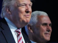 CHARLOTTE, NC - JULY 26:  Republican presidential candidate Donald Trump (L) and Republican vice presidential candidate Mike Pence are introduced at the 117th National Convention of the Veterans of Foreign Wars of the United States at the Charlotte Convention Center on July 26, 2016 in Charlotte, North Carolina. One day after Democrat presidential candidate Hillary Clinton faced the same group, Trump promised a revision to health care for veterans. (Photo by Sara D. Davis/Getty Images)