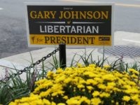 A campaign sign for Libertaian presidential candidate Gary Johnson, is placed in front of the Commission On Presidential Debates, September 30, 2016 in Washington, DC.