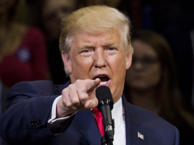 TOPSHOT - Republican presidential nominee Donald Trump speaks during a rally at Mohegan Sun Arena in Wilkes-Barre, Pennsylvania on October 10, 2016. / AFP / DOMINICK REUTER        (Photo credit should read