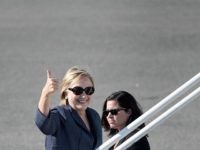 CORRECTION - Democratic presidential nominee Hillary Clinton boards her plane at Westchester County Airport October 18, 2016 in White Plains, New York. / AFP / Brendan Smialowski / The erroneous mention[s] appearing in the metadata of this photo by Brendan Smialowski has been modified in AFP systems in the following manner: [October 18, 2016] instead of [October 15, 2016]. Please immediately remove the erroneous mention[s] from all your online services and delete it (them) from your servers. If you have been authorized by AFP to distribute it (them) to third parties, please ensure that the same actions are carried out by them. Failure to promptly comply with these instructions will entail liability on your part for any continued or post notification usage. Therefore we thank you very much for all your attention and prompt action. We are sorry for the inconvenience this notification may cause and remain at your disposal for any further information you may require.        (Photo credit should read BRENDAN SMIALOWSKI/AFP/Getty Images)