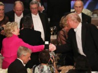 Hillary Clinton shakes hands with Donald Trump while attending the annual Alfred E. Smith Memorial Foundation Dinner at the Waldorf Astoria on October 20, 2016 in New York City.The white-tie dinner, which benefits Catholic charities and celebrates former Governor of New York Al Smith, has been attended by presidential candidates since 1960 and gives the candidates an opportunity to poke fun at themselves and each other. (Photo by