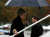 Democratic presidential nominee former Secretary of State Hillary Clinton boards her campaign plane at Westchester County Airport on October 27, 2016 in White Plains, New York.