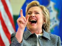 Hillary Laughing AP/Jessica Hill