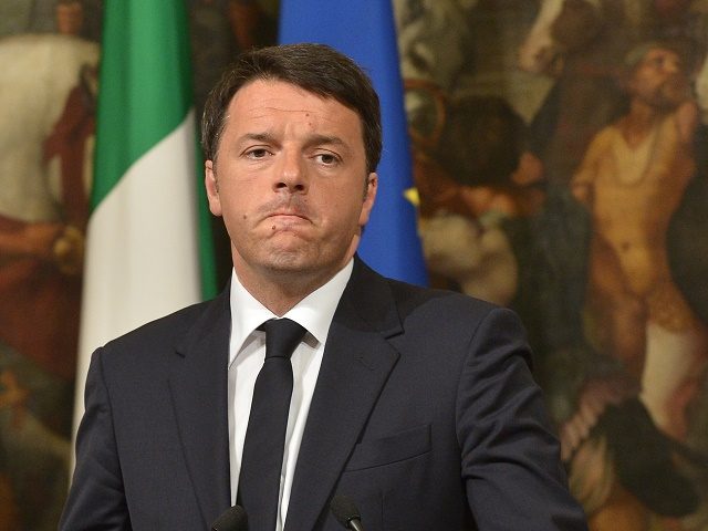 Italian Prime Minister Matteo Renzi gives a press conference focused on the shipwreck of migrants last night off the Libyan coast, on April 19, 2015 in Rome. Prime Minister Matteo Renzi said Rome would be seeking the extraordinary meeting after up to 700 people were feared to have drowned when a boat carrying them towards Italy capsized off Libya. "We are working to ensure this meeting can be held by the end of the week. It has to be a priority," Renzi told a press conference.  AFP PHOTO / TIZIANA FABI        (Photo credit should read TIZIANA FABI/AFP/Getty Images)