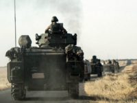 Turkish-troops-head-to-Syrian-border-Karkamis-Turkey-ap Halit Onur Sandal, AP