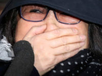 Choi Soon-sil, a cult leader's daughter with a decades-long connection to South Korean President Park Geun-hye, arrives at the Seoul Central District Prosecutors' Office in Seoul, South Korea, Monday, Oct. 31, 2016. The woman at the center of a scandal roiling South Korea met Monday with prosecutors examining whether she used her close ties to Park to pull government strings from the shadows and amass an illicit fortune. (Seo Myung-gon/Yonhap via AP)