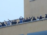 Migrants Smash Up Deportation Centre, Protest for 11 Hours on Roof