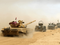 Iraqi forces deploy on October 17, 2016 in the area of al-Shurah, some 45 kms south of Mosul, as they advance towards the city to retake it from the Islamic State (IS) group jihadists. Some 30,000 federal forces are leading the offensive, backed by air and ground support from a 60-nation US-led coalition, in what is expected to be a long and difficult assault on IS's last major Iraqi stronghold. / AFP / AHMAD AL-RUBAYE (Photo credit should read AHMAD AL-RUBAYE/AFP/Getty Images)