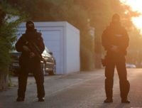 Special police forces block the street near a refugee shelter where a 27-year-old Syrian migrant who set off an explosive device near an open-air music festival have stayed, on July 25, 2016 in Ansbach.
A Syrian migrant set off an explosive device near an open-air music festival in southern Germany that killed himself and wounded a dozen others, authorities said Monday, the third attack to hit the region in a week. / AFP / dpa / Daniel Karmann / Germany OUT        (Photo credit should read DANIEL KARMANN/AFP/Getty Images)