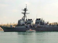 FILE- In this Saturday, March 12, 2011 file photo, U.S. destroyer USS Mason sails in the Suez canal in Ismailia, Egypt. Two missiles fired from rebel-held territory in Yemen landed near an American destroyer passing by in the Red Sea, the U.S. Navy said on Monday, Oct. 10, 2016. (AP Photo/File)