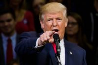Republican presidential nominee Donald Trump said he was preparing a lawsuit against The New York Times, which published the accounts of two women who accused Trump of groping and kissing them years ago
