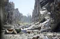 According to an official at the Syrian branch of the Palestine Liberation Organisation, IS has destroyed gravestones in the embattled Palestinian refugee camp of Yarmuk on the outskirts of Damascus, Syria