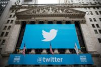 The Twitter logo displayed on a banner outside the New York Stock Exchange