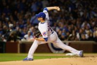 Kyle Hendricks of the Chicago Cubs throws a pitch in the first inning against the Los Angeles Dodgers during game six of the National League Championship Series, at Wrigley Field in Chicago, Illinois, on October 22, 2016
