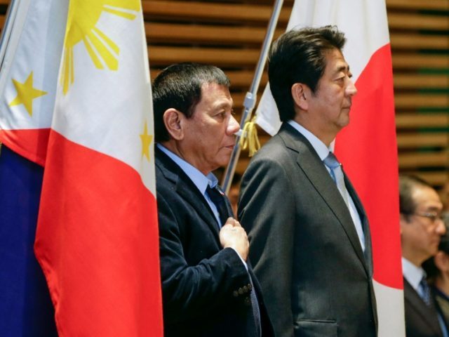 Japan is one of the top US allies in Asia, and Rodrigo Duterte (L) said Shinzo Abe (R) had raised the issue with him in a meeting