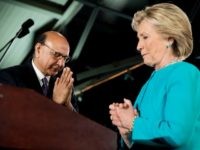 Khizr Khan, the father of fallen Army Capt. Humayun Khan, left, introduces Democratic presidential candidate Hillary Clinton, right, during a rally at The Armory at the Radisson Hotel in Manchester, N.H., Sunday, Nov. 6, 2016. (
