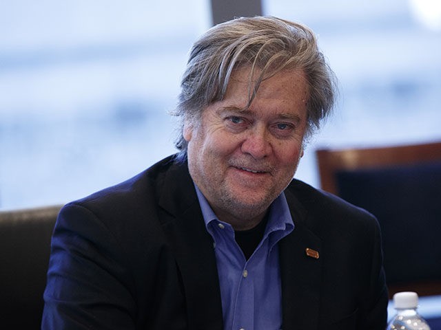 Steve Bannon, campaign CEO for Republican presidential candidate Donald Trump, right, looks on during a national security meeting with advisors at Trump Tower, Friday, Oct. 7, 2016, in New York. (AP Photo/ Evan Vucci)