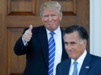President-elect Donald Trump gives the thumbs-up as Mitt Romney leaves Trump National Golf Club Bedminster in Bedminster, N.J., Saturday, Nov. 19, 2016. (