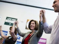 UNITED STATES - NOVEMBER 5: From left, Jacky Rosen, Democratic candidate for Nevadas 3rd Congressional district, Catherine Cortez Masto, Democratic candidate for U.S. Senate from Nevada, and Ruben Kihuen, Democratic candidate for Nevadas 4th Congressional district, hold hands in the air after speaking to campaign volunteers at a campaign office in Las Vegas, Nevada on Saturday, Nov. 5 , 2016. (Photo By Bill Clark/CQ Roll Call)