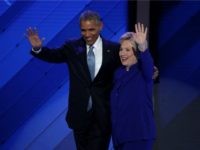 President Barack Obama and Democratic Presidential nominee Hillary Clinton wave to the crowd on the third day of the Democratic National Convention at the Wells Fargo Center, July 27, 2016 in Philadelphia, Pennsylvania. Democratic presidential candidate Hillary Clinton received the number of votes needed to secure the party's nomination. An estimated 50,000 people are expected in Philadelphia, including hundreds of protesters and members of the media. The four-day Democratic National Convention kicked off July 25. (Photo by