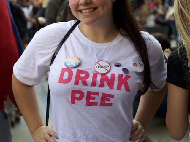 PHILADELPHIA, PA - NOVEMBER 19:  Alexis Trainer, 16, wears an anti-Trump and Bernie 2016 pin while joining more than a thousand protesters demonstrating against President-elect Donald Trump at Thomas Paine Plaza November 19, 2016 in Philadelphia, Pennsylvania.  Today marks the 11th consecutive day of anti-Trump protests in Philadelphia, with plans to demonstrate everyday through inauguration day, January 20, 2017.  (Photo by Mark Makela/Getty Images)